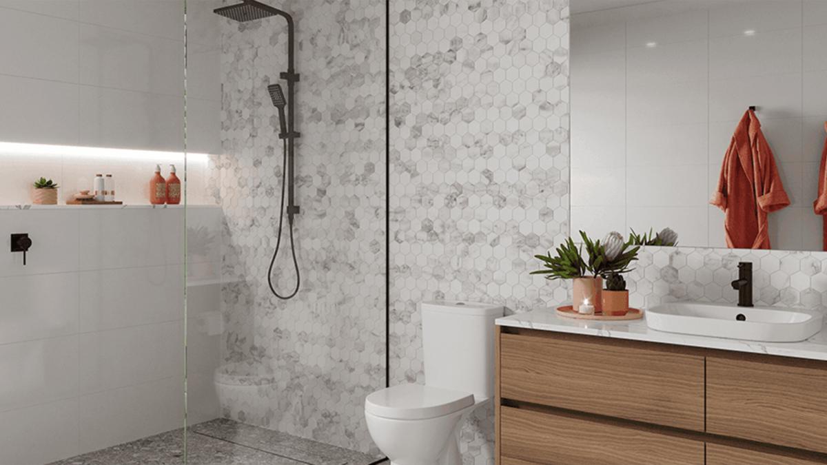 White bathroom with black rail shower, terrazzo floor, timber vanity and Raymor Classic toilet suite