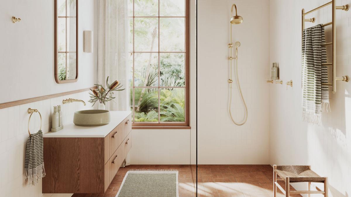 White bathroom with timber vanity, Phoenix Cromford brushed gold twin shower and heated towel ladder