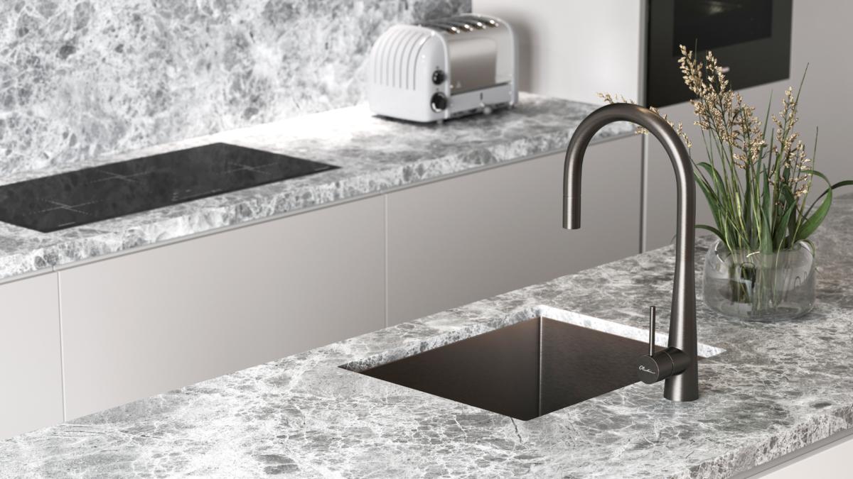Grey marble kitchen bench with Oliveri Spectra gunmetal sink and gunmetal mixer