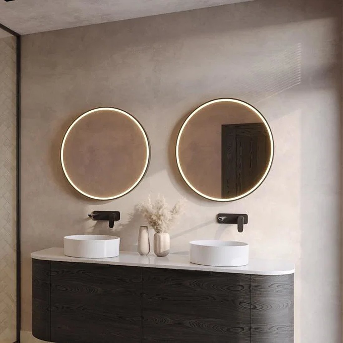 Bathroom with twin round LED mirrors, black wall tapware and a dark timber double vanity