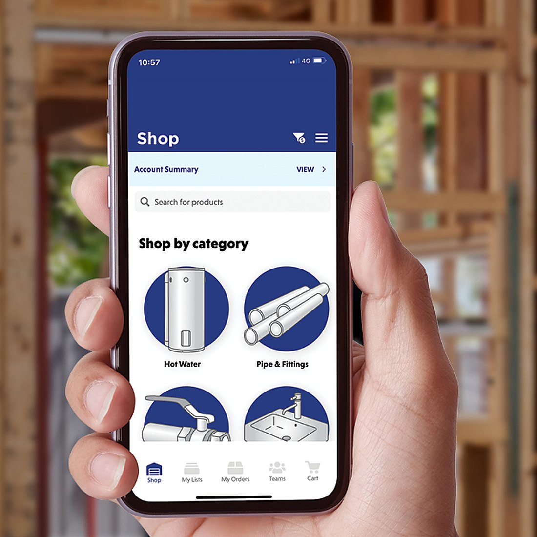 A hand holding a phone showing the Tradelink trade app Shop by category screen