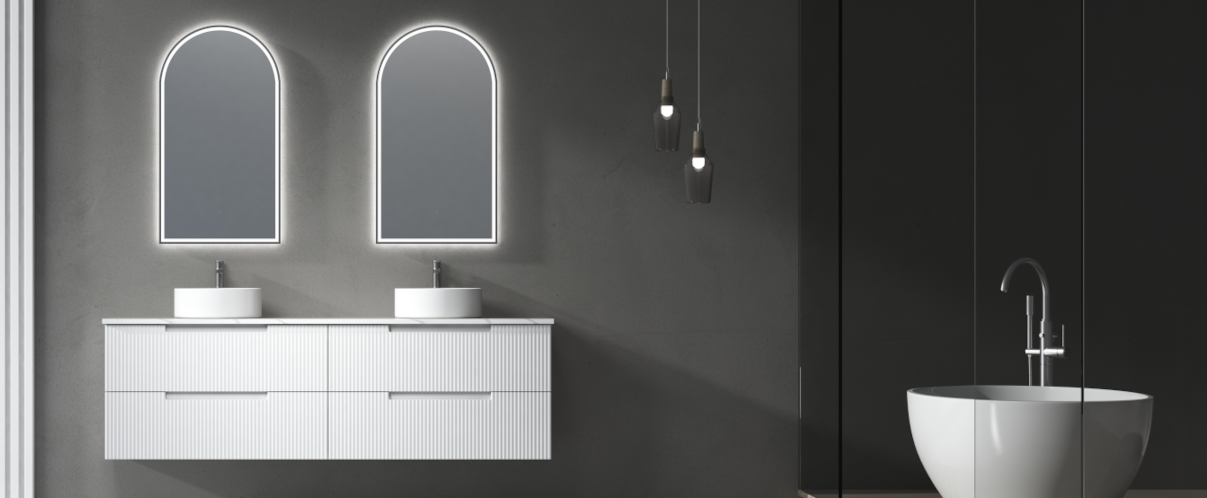 Dark bathroom colour scheme with white bath and vanity, chrome tapware and smart mirrors