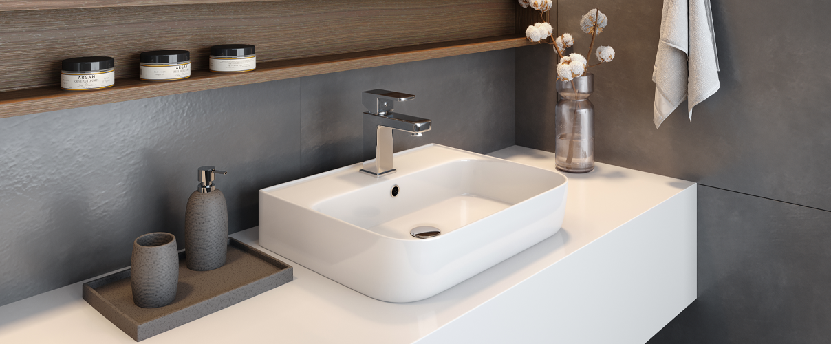 White and grey bathroom with white sink and chrome tapware as well as grey bathroom accessories